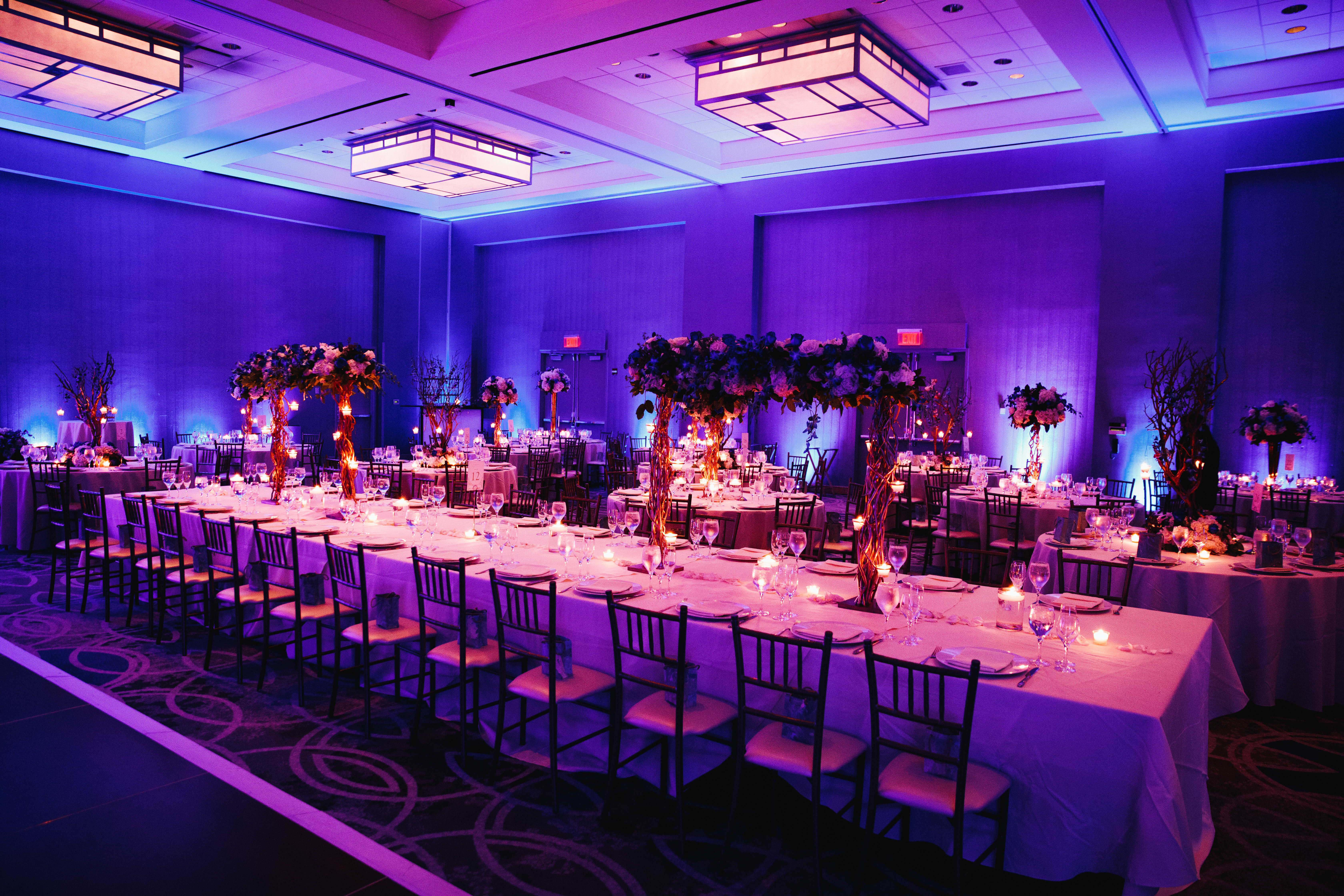 Decorated banquet hall with floral arrangements