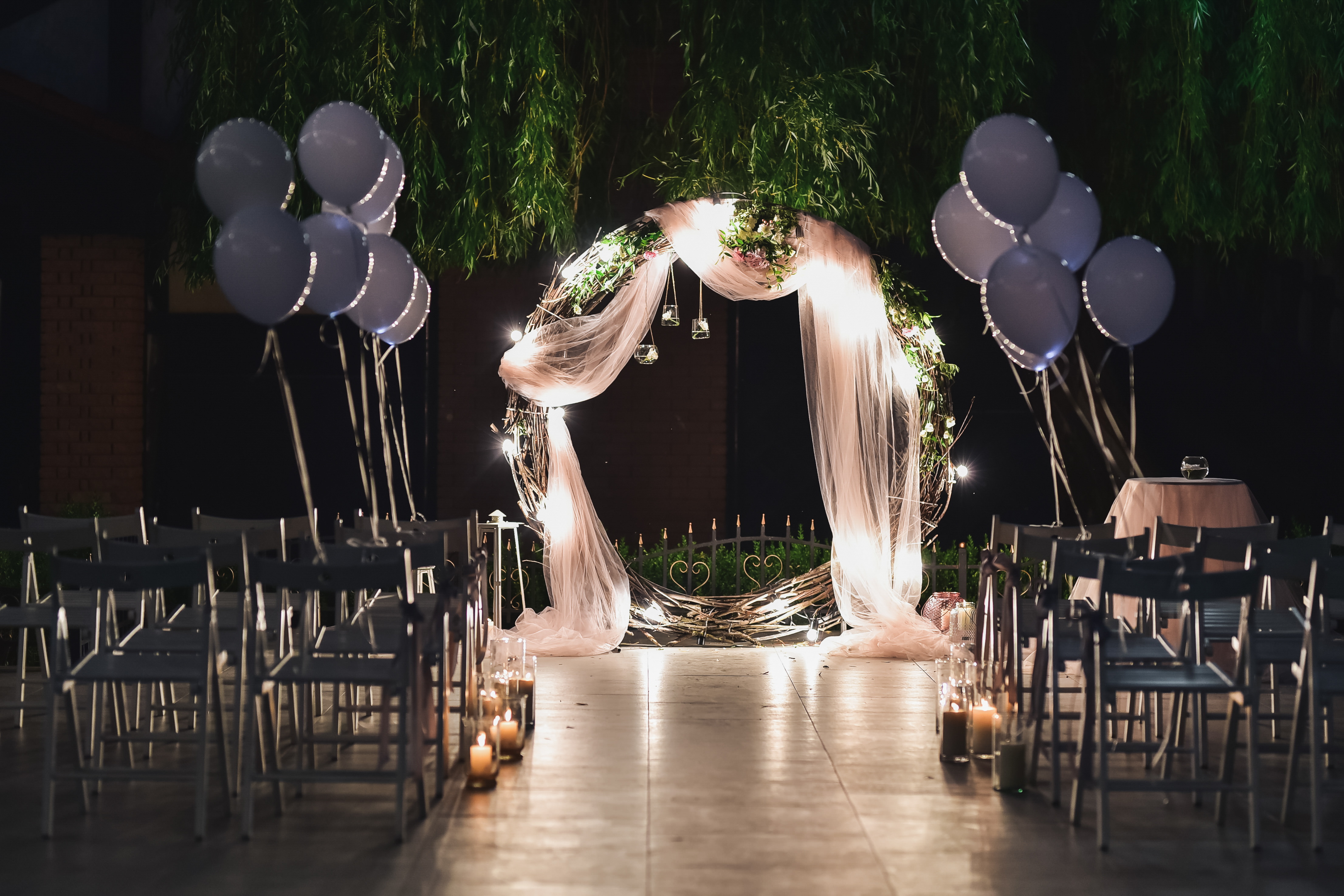 Outdoor celebration altar with balloons